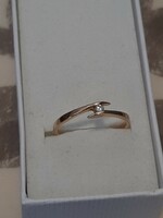 Rose gold ring with diamond decoration