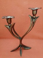 2-branched, table-top, flower-shaped candle holder, made of brass.