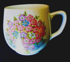 A charming floral mug with a pot belly. 240.
