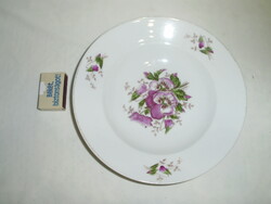 Old porcelain plate with pansy pattern, wall plate