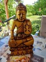Carved wooden Buddha statue