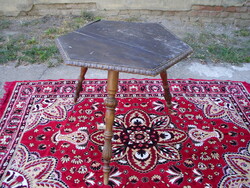 Antique hexagonal card table with carved legs
