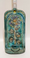 Marked, floral pattern, blue-green glazed craftsman ceramic candle holder, wall decoration (2302)