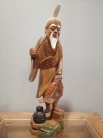 Oriental carved statue. Negotiable!!