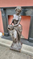 Antique art nouveau bronze sculpture: woman with a jug