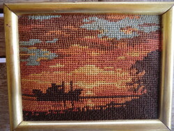 Idyllic atmosphere with a sunset boat on needle tapestry 15x12 cm with a gilded frame