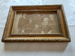 Rego photo glass in a wooden frame