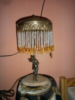 S22-37 art-deco table lamp. With beaded shade.