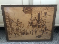 Wood graphics made with the pyrograph technique