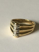 18 karátos, cirkónia kövekkel díszített női aranygyűrű