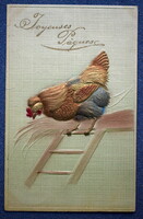 Antique embossed relief Easter greeting card golden hen on the ladder