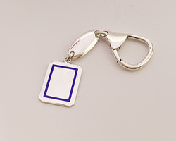 Solid, enamelled, engravable silver key ring.