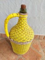 Yellow, old demijohn covered with plastic braiding, 4.5 l
