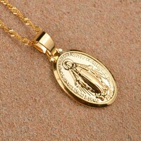 Golden Virgin Mary pendant on a beautiful twisted chain.