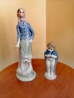 Porcelain woman with geese and a child