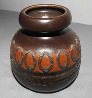 A very retro pot-bellied ceramic vase, he indicated