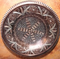 Densely engraved red copper table centerpiece