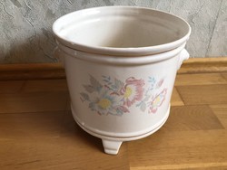 A ceramic champagne / ice / wine holder with a flower pattern or even a caspo?