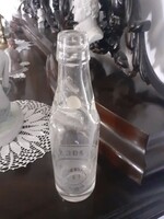 Old syrupy soda bottle