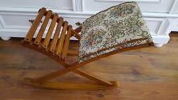 Old, padded comfort wooden footrest