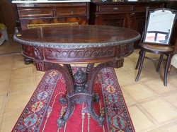 Baroque carved oval table.