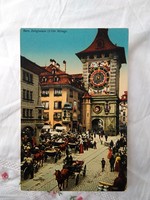 Antique Swiss colored postcard, Bern clock tower, horse-drawn carriage, passers-by, street scene, circa 1910