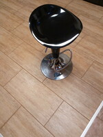 Gas spring barstools with chrome legs.