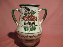 Ceramic vase with a handle