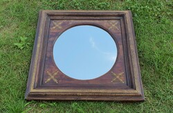 Indonesian mirror in a wooden frame...