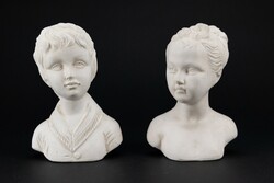 Porcelain girl and boy statue
