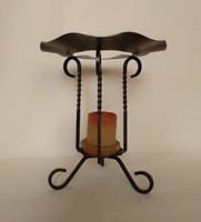 Three-legged, retro wrought iron candle holder from the 60s, with original candle