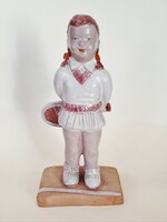 Nice ceramic figure of a little girl playing tennis