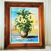 Kata Gömör's painting Sunflowers is framed by a beautiful painting