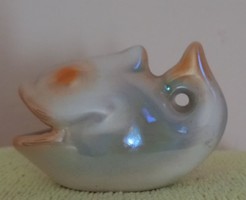 Ceramic ring holding fish