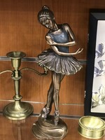 Bronzed ballerina statue