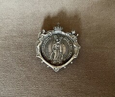 Religious medal in silver socket