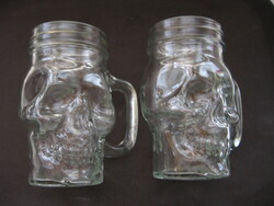 Pair of skull-shaped jugs