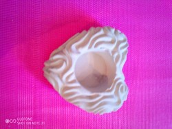 Heart-shaped candle holder. New