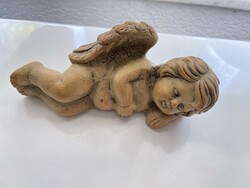 Fairy lying ceramic angel.