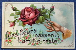 Antique embossed litho commemorative postcard hand holding a rose