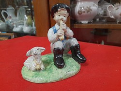 Izsépy ceramic figure of a boy playing a flute with a lamb.