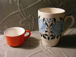 Red granite cup and blue floral mug