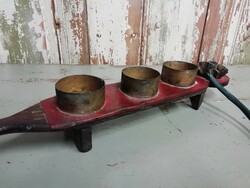 It's an old tool, maybe a title painter's paint holder, or some other tool, maybe a patent piece
