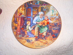 - Porcelain wall decorative plate with a family scene -- serially numbered, limited.