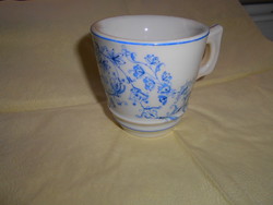 Thick, heavy porcelain cup in cafe