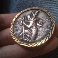 Antique coin, patron saint of travelers