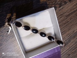A silver onyx bracelet for Sattigirb?