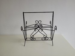 Old retro wrought iron newspaper stand