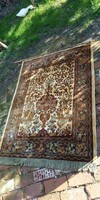 Old showy wall rug with an animal motif