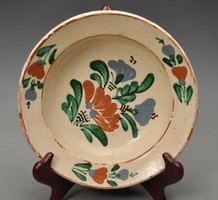 Transylvanian earthenware deep plate, hand painted. 100 years old.